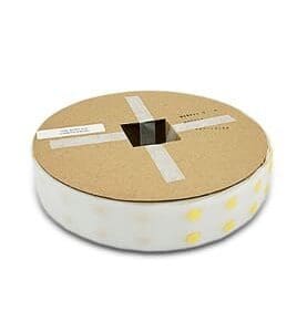 Yellow dot labels on a cardboard spool.