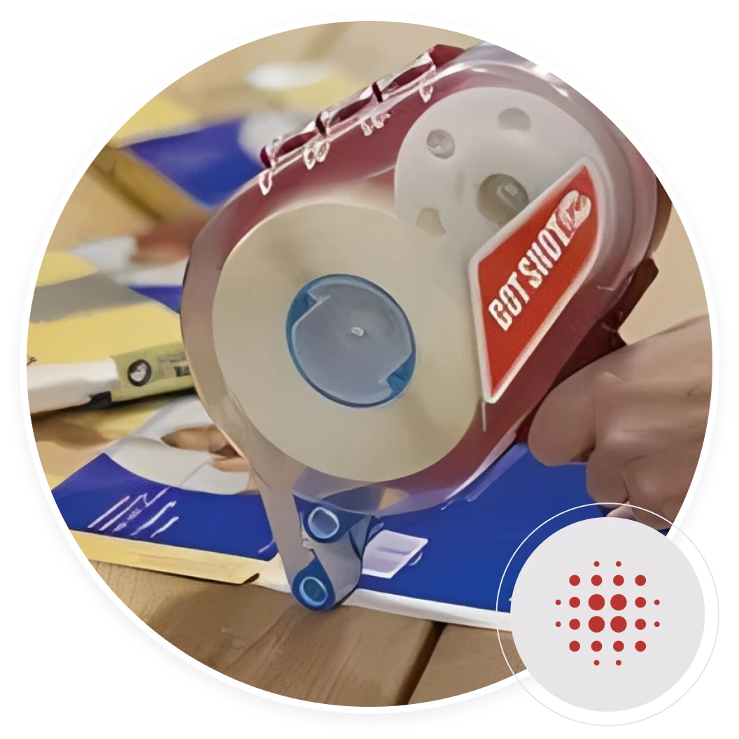 Tape dispenser sealing a box